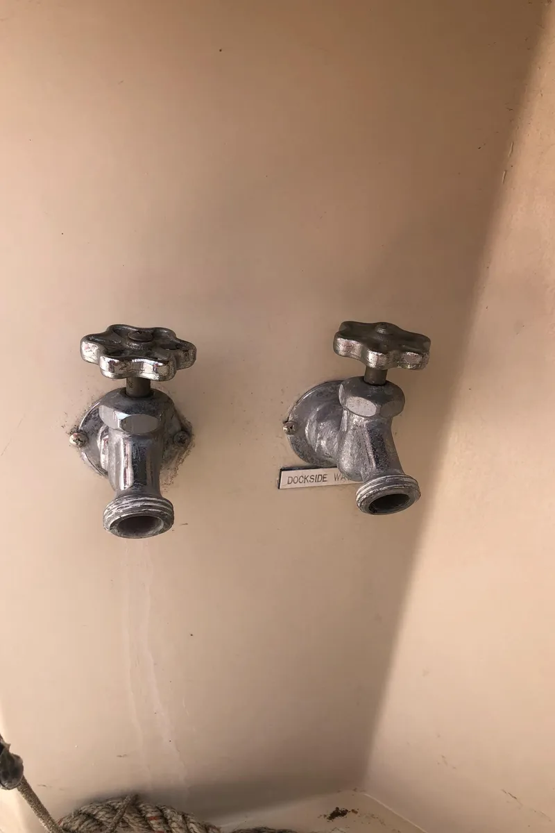 Slide: The Image of Two faucets on an Egg Harbor Convertible 37, 1987 model. - 13