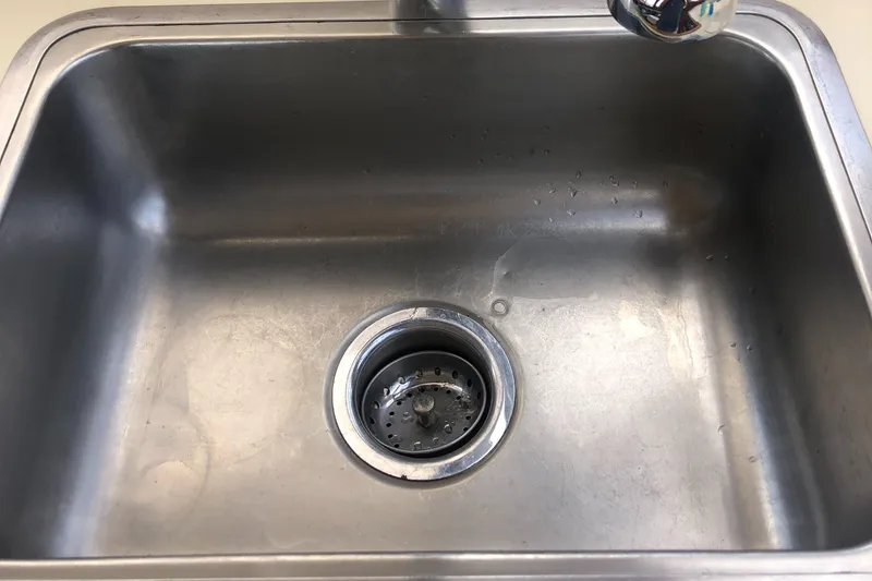 Slide: The Image of Stainless steel sink in Egg Harbor Convertible 37, 1987 model. - 24