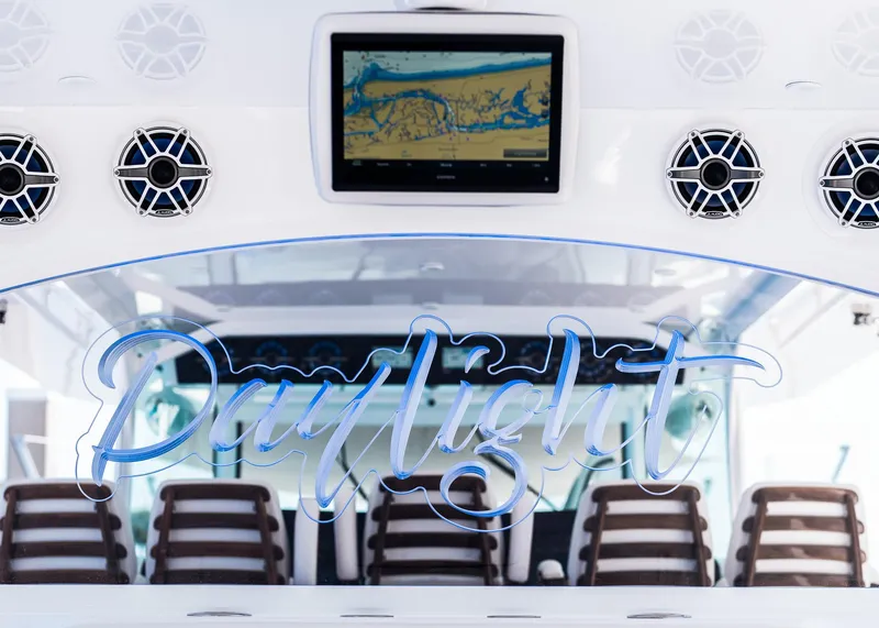 Slide: The Image of 2021 HCB Estrella boat interior with Daylight sign and navigation screen. - 20