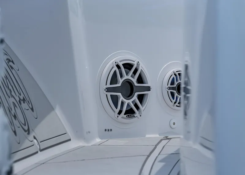 Slide: The Image of Close-up of JL Audio speakers on a 2021 HCB Estrella boat. - 22