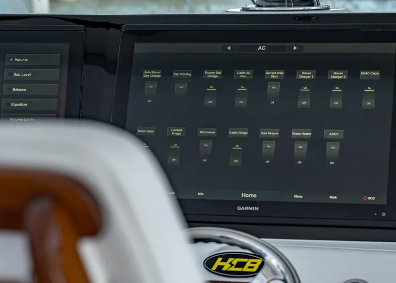 Slide: The Image of Control panel of a 2021 HCB Estrella boat with touchscreen interface. - 23