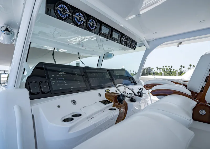 Slide: The Image of Interior cockpit of 2021 HCB Estrella boat with advanced navigation systems and luxurious seating. - 24