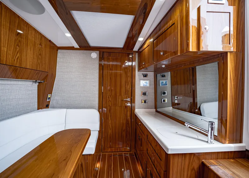 Slide: The Image of Luxurious interior of 2021 HCB Estrella yacht with polished wood finishes and modern amenities. - 33