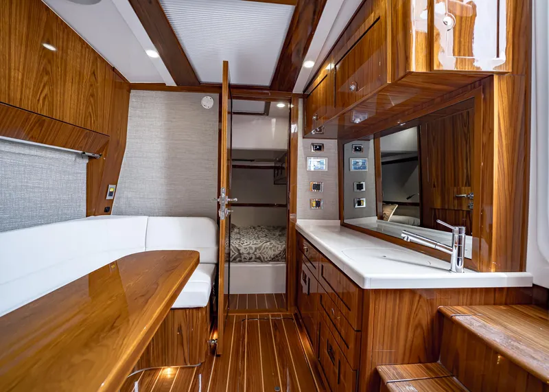 Slide: The Image of Luxurious interior of 2021 HCB Estrella yacht with polished wood finishes and modern amenities. - 7