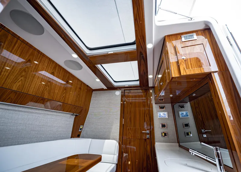 Slide: The Image of Luxurious interior of 2021 HCB Estrella yacht with wood finish and skylights. - 8