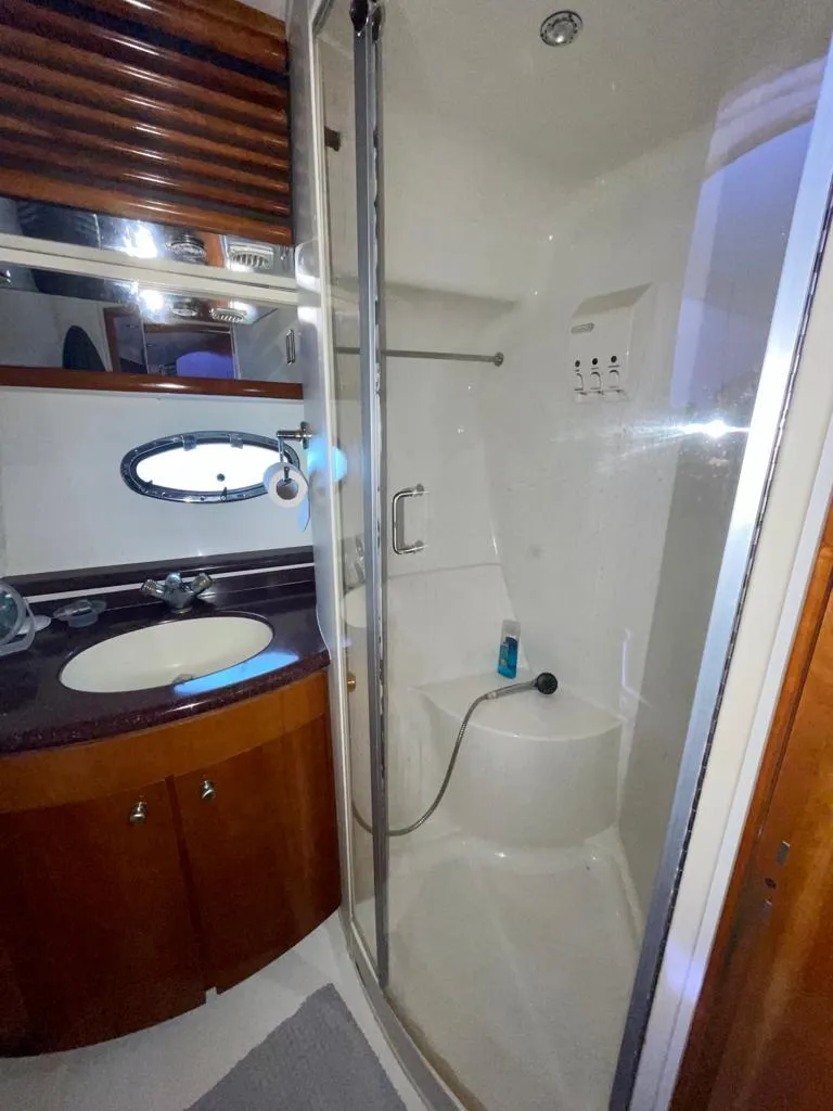 Slide: The Image of Bathroom interior of 2000 Carver 45 Voyager yacht with shower and sink. - 9