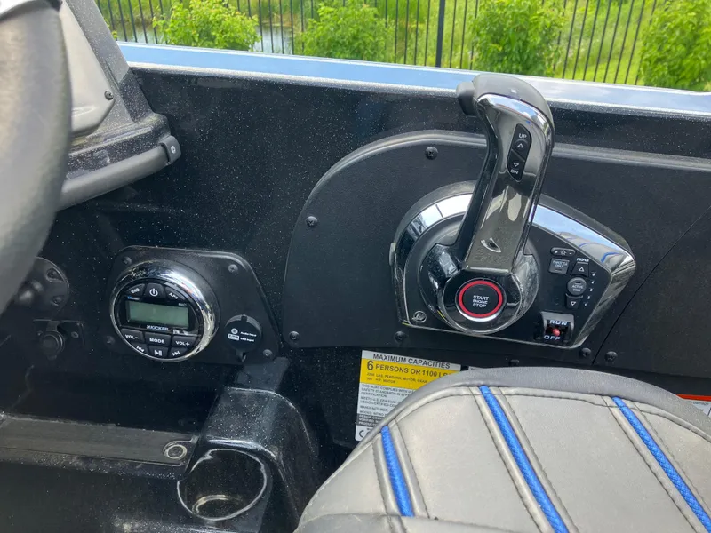 Slide: The Image of Control panel of 2024 Nitro ZV20 Pro boat with start-stop button and audio controls. - 10