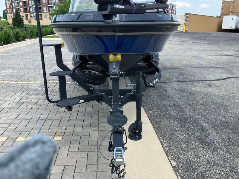 Slide: The Image of 2024 Nitro ZV20 Pro boat on trailer in parking lot. - 3