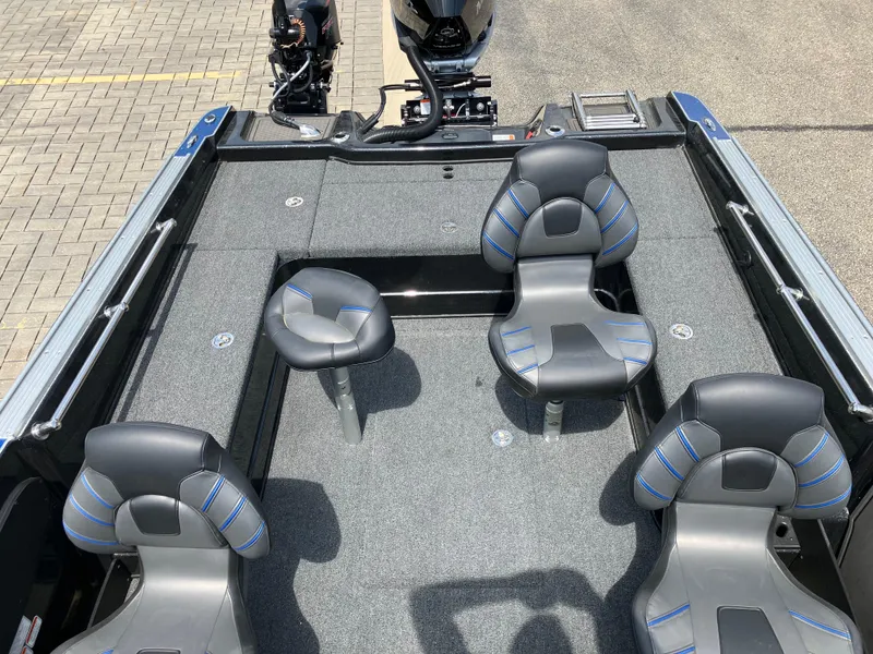 Slide: The Image of 2024 Nitro ZV20 Pro boat interior with four cushioned seats and a motor. - 9