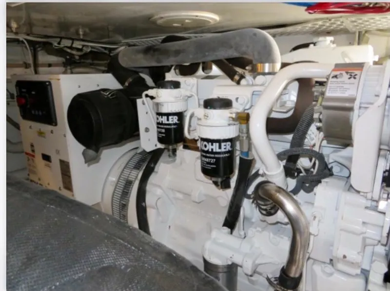 Slide: The Image of Engine room of 2000 Buddy Davis 78 yacht with Kohler components. - 33