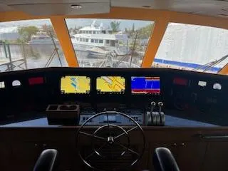 Slide: The Image of Interior view of 2000 Buddy Davis 78 yacht helm with navigation screens. - 38
