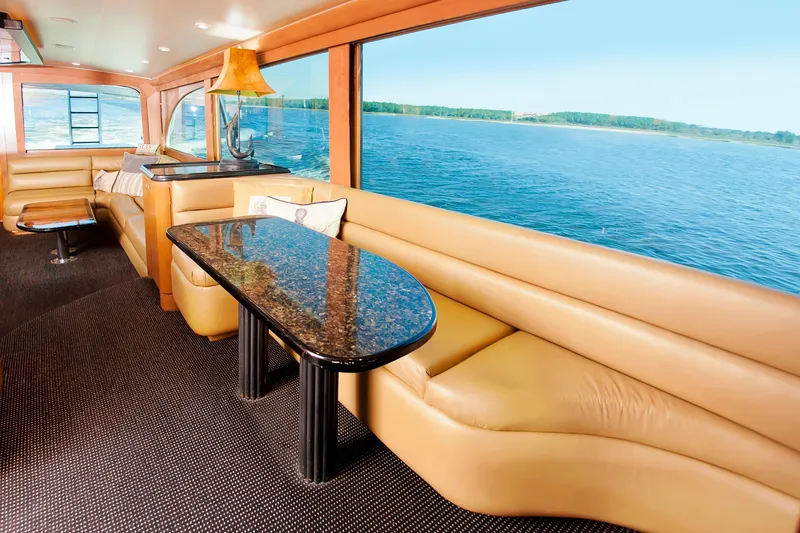 Slide: The Image of Luxurious interior of 2000 Buddy Davis 78 yacht with ocean view and elegant seating. - 8