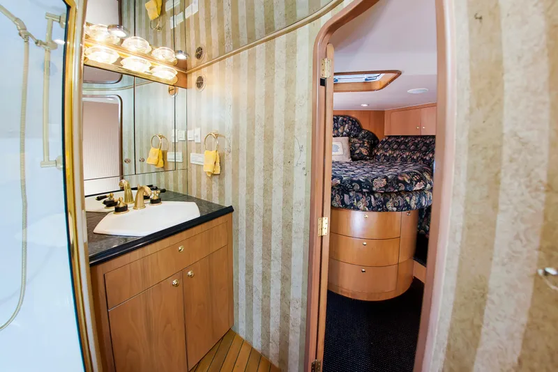 Slide: The Image of Luxurious bathroom and bedroom interior of 2000 Buddy Davis 78 yacht. - 17