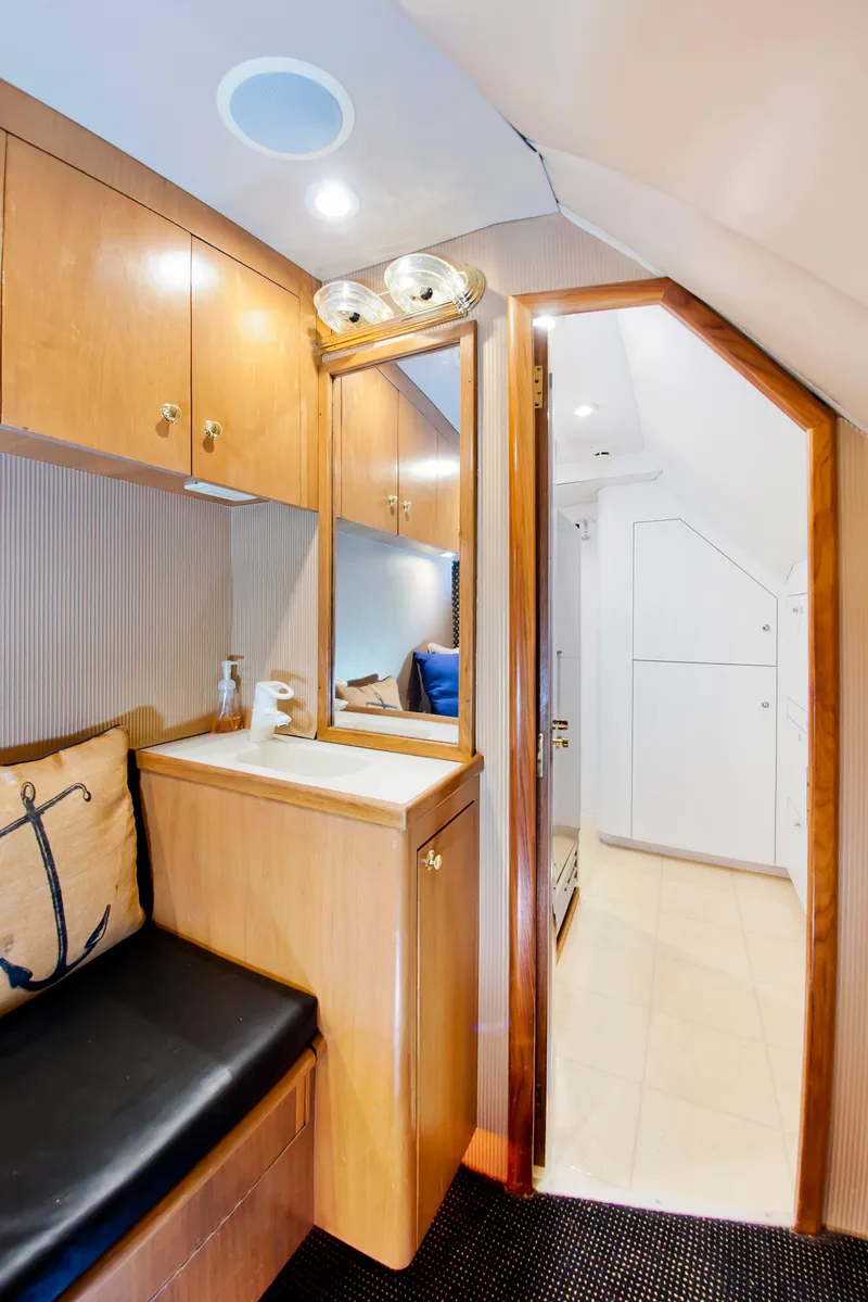 Slide: The Image of Interior of 2000 Buddy Davis 78 yacht with wooden cabinetry and seating. - 20