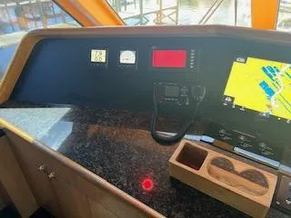 Slide: The Image of Control panel of a 2000 Buddy Davis 78 yacht with navigation equipment. - 40