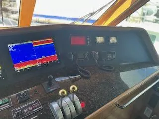 Slide: The Image of Control panel of a 2000 Buddy Davis 78 yacht with navigation equipment. - 41
