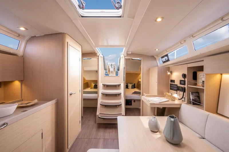 Slide: The Image of 2024 Beneteau Oceanis 37.1 yacht interior with modern design and natural light. - 17