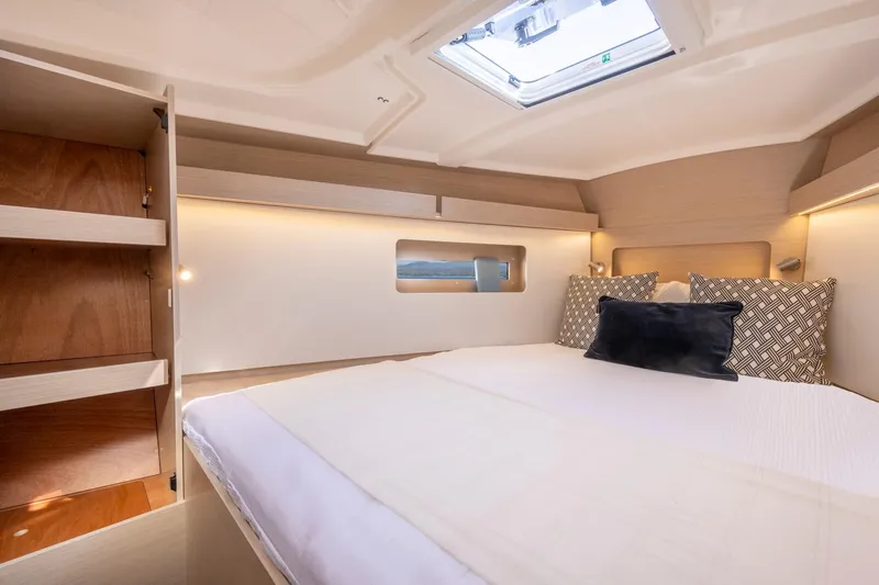 Slide: The Image of 2024 Beneteau Oceanis 37.1 yacht cabin with modern design and skylight. - 18