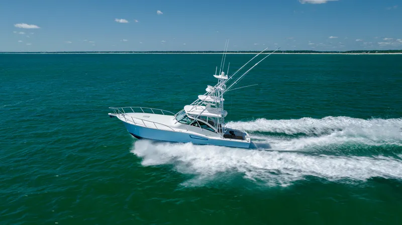 Slide: The Image of 2019 Albemarle 410 Express Fisherman cruising on open water. - 14
