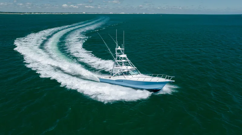 Slide: The Image of 2019 Albemarle 410 Express Fisherman cruising on open water. - 16
