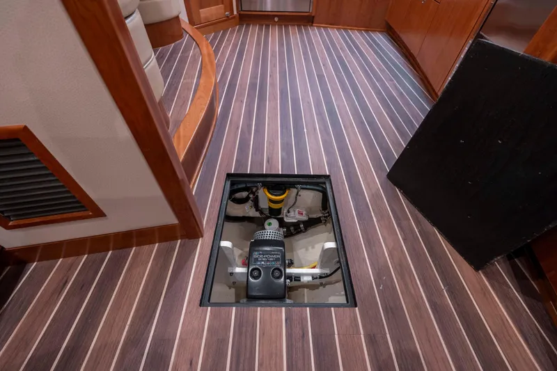 Slide: The Image of 2019 Albemarle 410 Express Fisherman interior with open engine access hatch. - 37