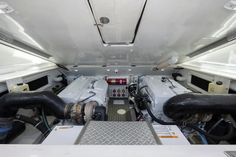 Slide: The Image of 2019 Albemarle 410 Express Fisherman engine room with dual engines. - 41