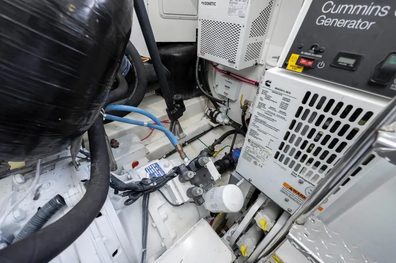 Slide: The Image of Engine room of a 2019 Albemarle 410 Express Fisherman with Cummins generator. - 46