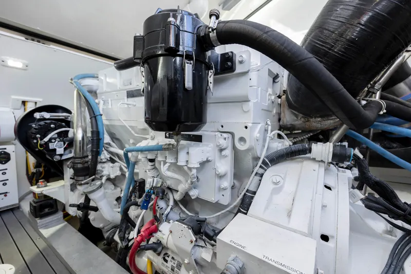 Slide: The Image of 2019 Albemarle 410 Express Fisherman engine room with detailed machinery. - 48