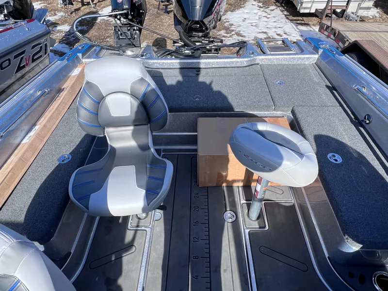 Slide: The Image of 2024 Nitro ZV20 boat interior with two seats and storage area. - 12