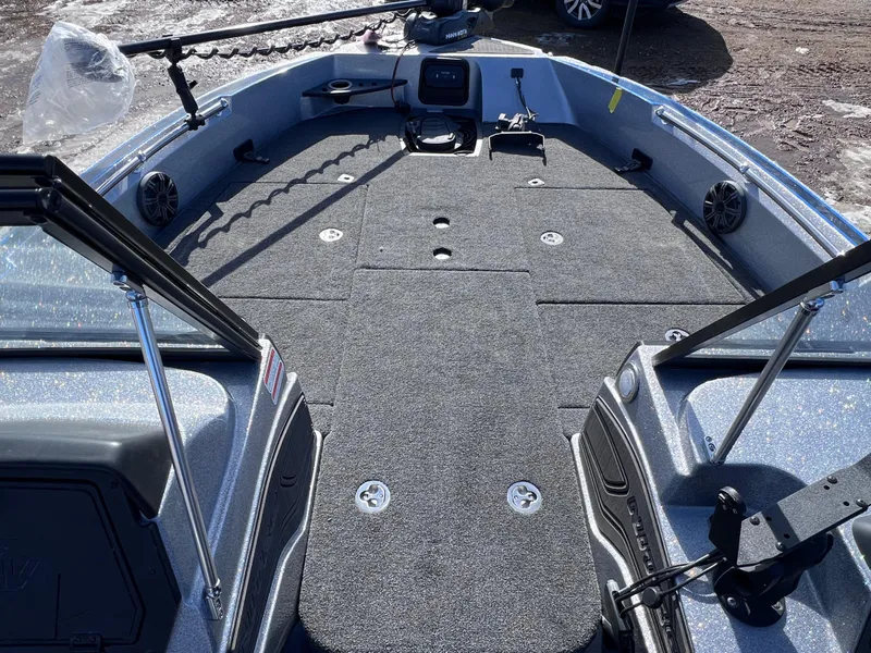 Slide: The Image of 2024 Nitro ZV20 fishing boat interior with spacious deck and advanced equipment. - 15