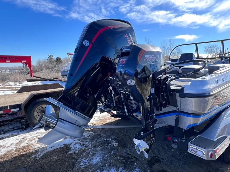 Slide: The Image of 2024 Nitro ZV20 boat with powerful outboard motor in a snowy outdoor setting. - 6