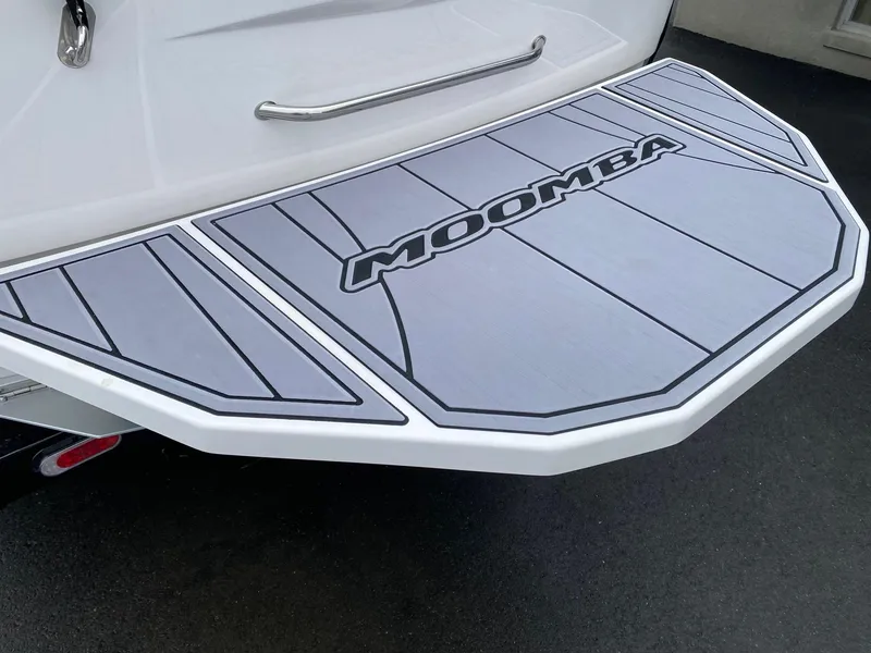 Slide: The Image of 2023 Moomba Mojo boat swim platform with logo. - 9