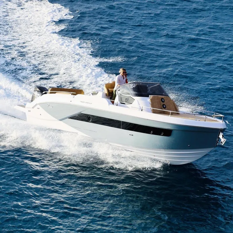 Slide: The Image of 2024 Ranieri 275 SL boat with twin outboard engines, rear view. - 11