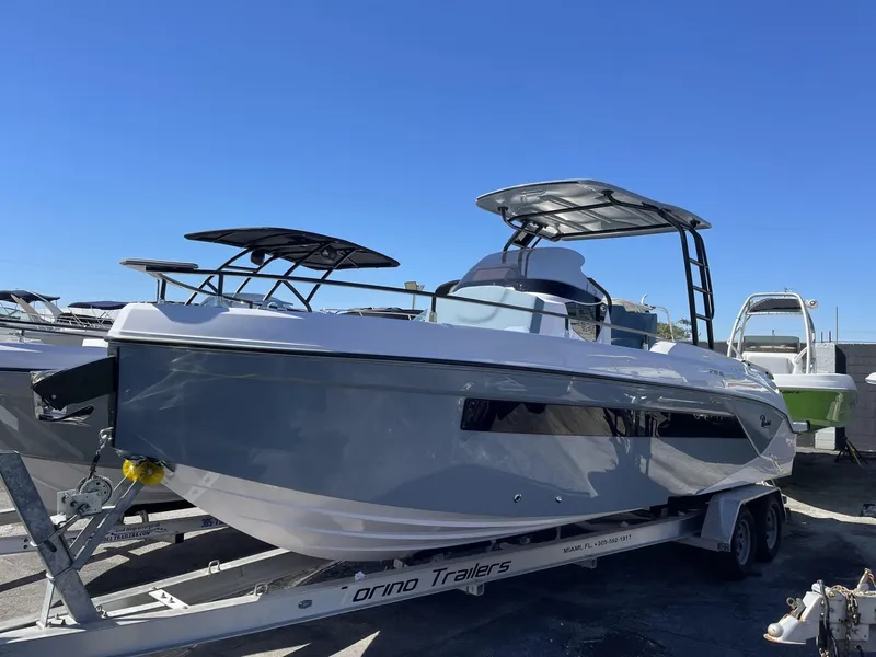 Slide: The Image of 2024 Ranieri 275 SL boat on trailer, rear view, sunny day. - 30