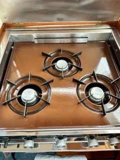 Slide: The Image of Three-burner stove on a 1996 Grand Banks Classic yacht. - 41