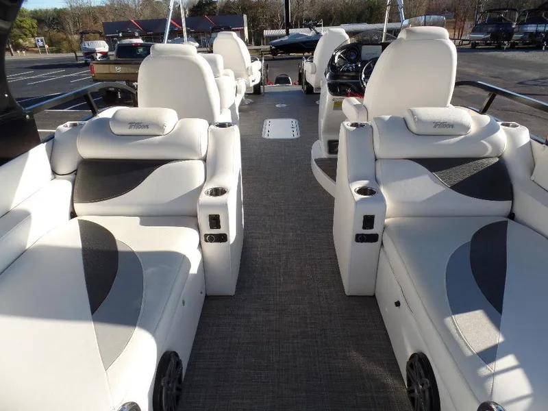 Slide: The Image of 2017 JC Sporttoon 28TT pontoon boat interior with luxurious seating and modern design. - 28