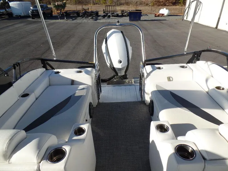 Slide: The Image of 2017 JC Sporttoon 28TT pontoon boat with spacious seating and outboard motor. - 30