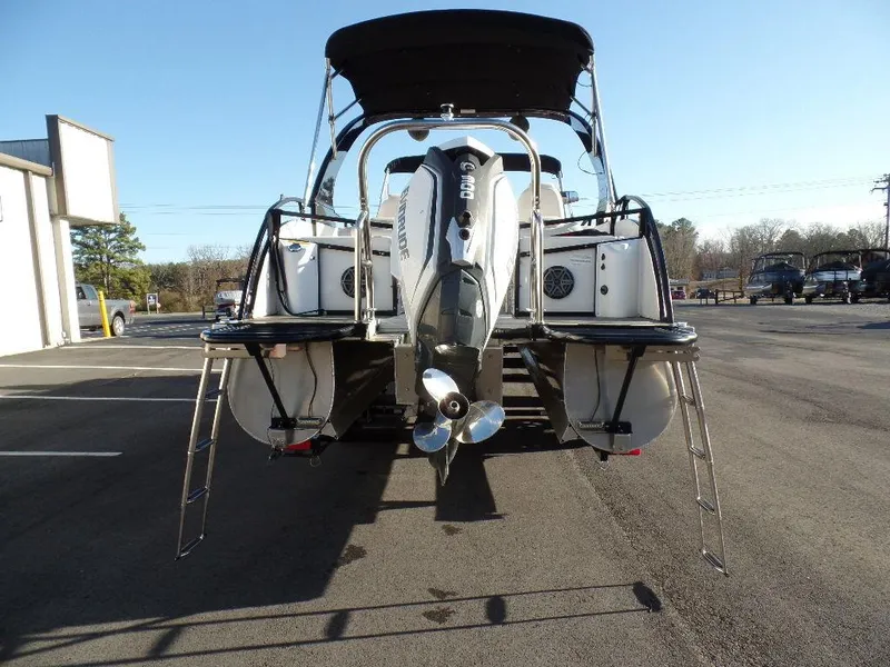 Slide: The Image of 2017 JC Sporttoon 28TT pontoon boat rear view with outboard motor. - 4