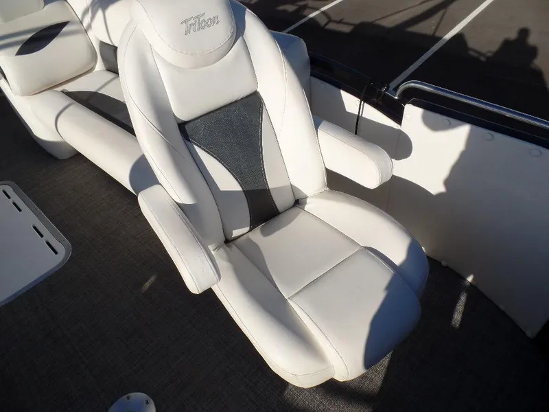 Slide: The Image of 2017 JC Sporttoon 28TT boat with white and gray captain's chair. - 9