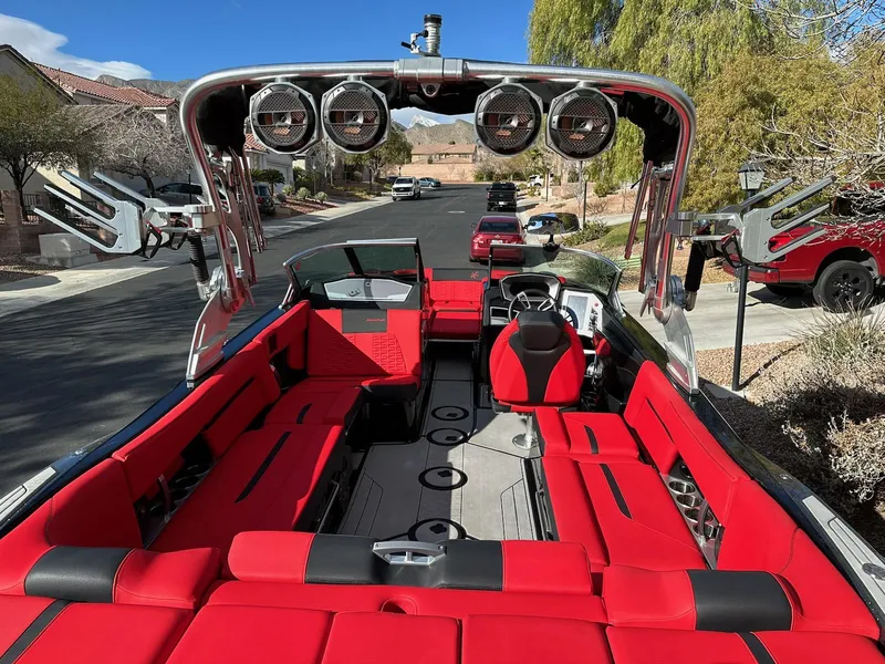 Slide: The Image of 2020 MasterCraft X24 boat with red interior and advanced sound system. - 4