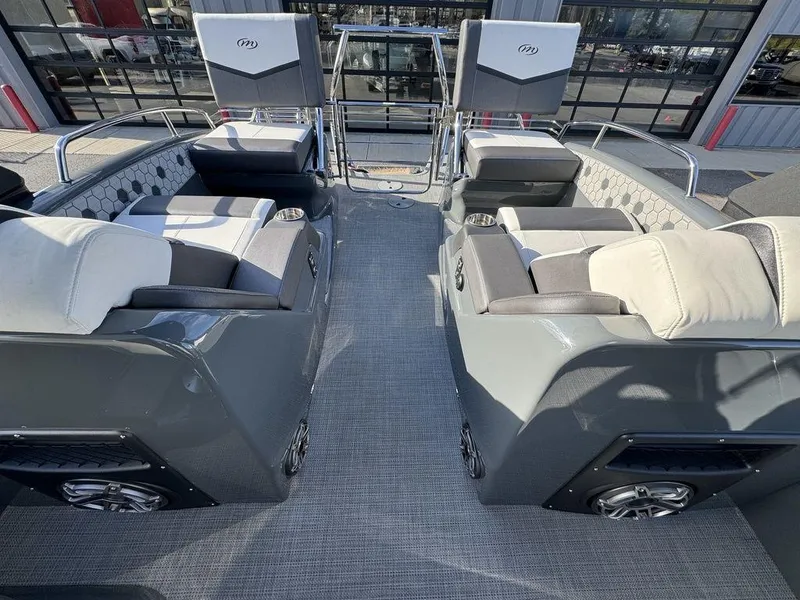 Slide: The Image of 2024 Manitou XT 23 Split Rear Sport (SRS) Single Engine V-Toon interior seating area. - 17