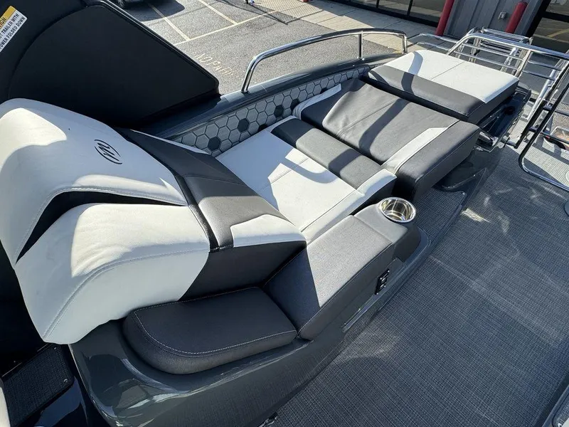 Slide: The Image of 2024 Manitou XT 23 Split Rear Sport (SRS) Single Engine V-Toon boat seating area. - 20