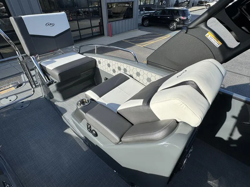 Slide: The Image of 2024 Manitou XT 23 Split Rear Sport (SRS) Single Engine V-Toon interior seating. - 22