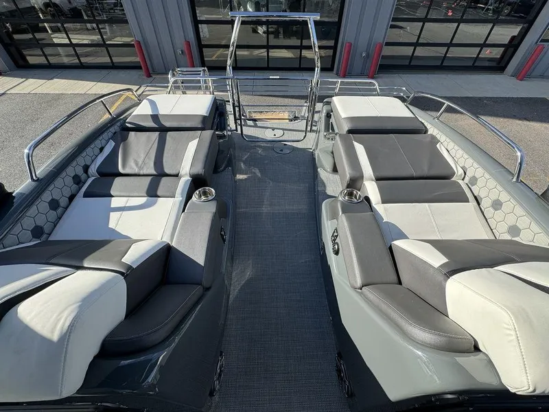 Slide: The Image of 2024 Manitou XT 23 Split Rear Sport (SRS) Single Engine V-Toon interior seating. - 24