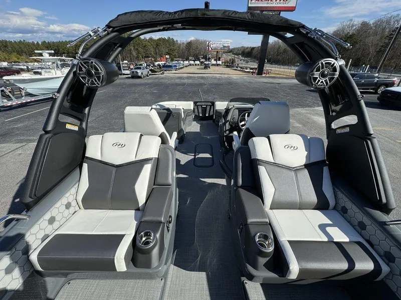 Slide: The Image of 2024 Manitou XT 23 Split Rear Sport (SRS) Single Engine V-Toon interior, luxury seating and speakers. - 27