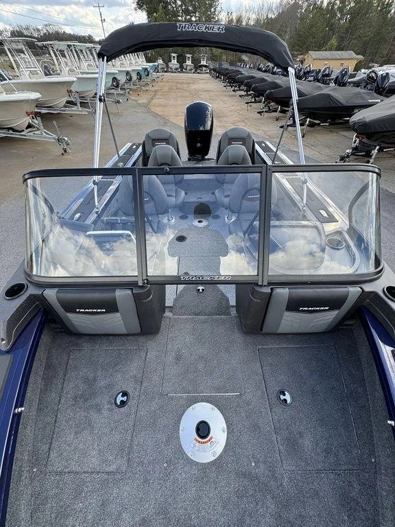 Slide: The Image of 2024 Tracker Targa™ V-18 Combo boat interior with seating and windshield. - 13