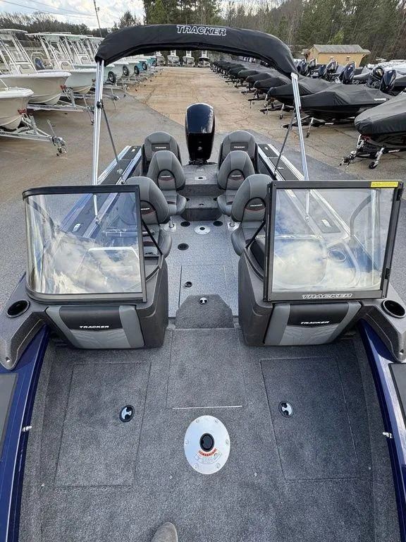 Slide: The Image of 2024 Tracker Targa™ V-18 Combo boat interior with seating and windshield. - 14