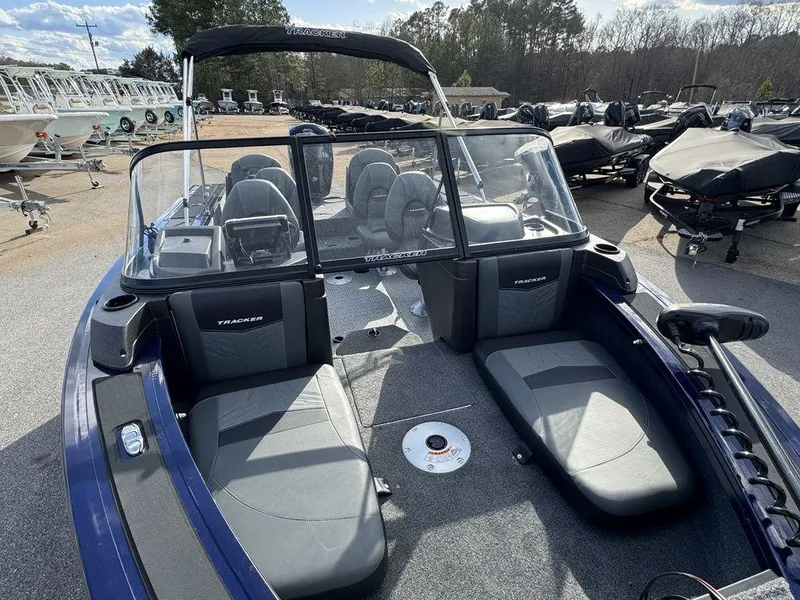 Slide: The Image of 2024 Tracker Targa™ V-18 Combo boat interior with seating and windshield. - 15