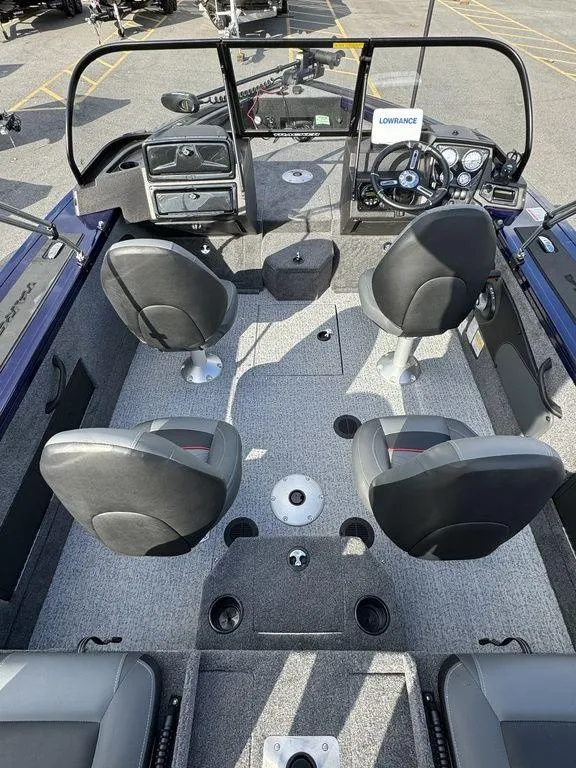 Slide: The Image of 2024 Tracker Targa™ V-18 Combo boat interior with four seats and modern dashboard. - 27