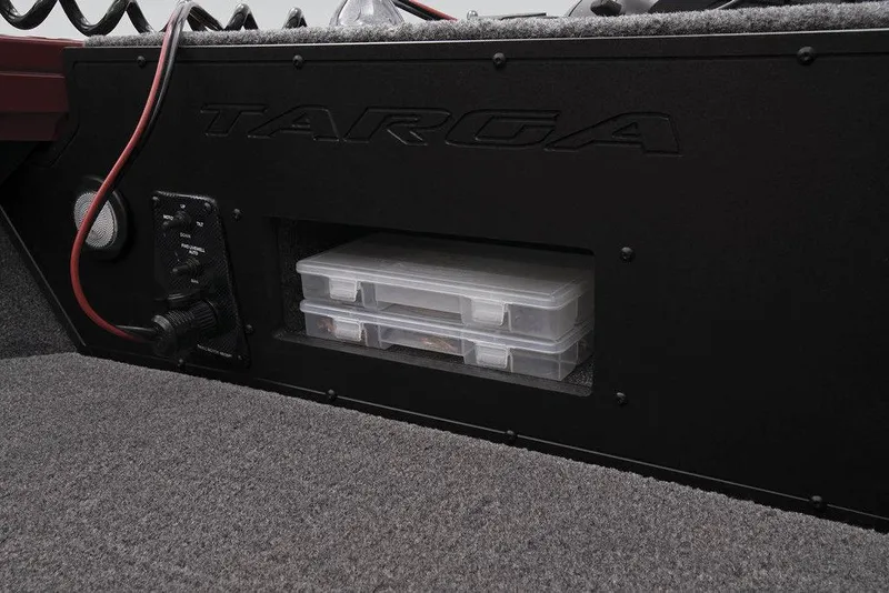 Slide: The Image of 2024 Tracker Targa™ V-18 Combo storage compartment with tackle boxes. - 39